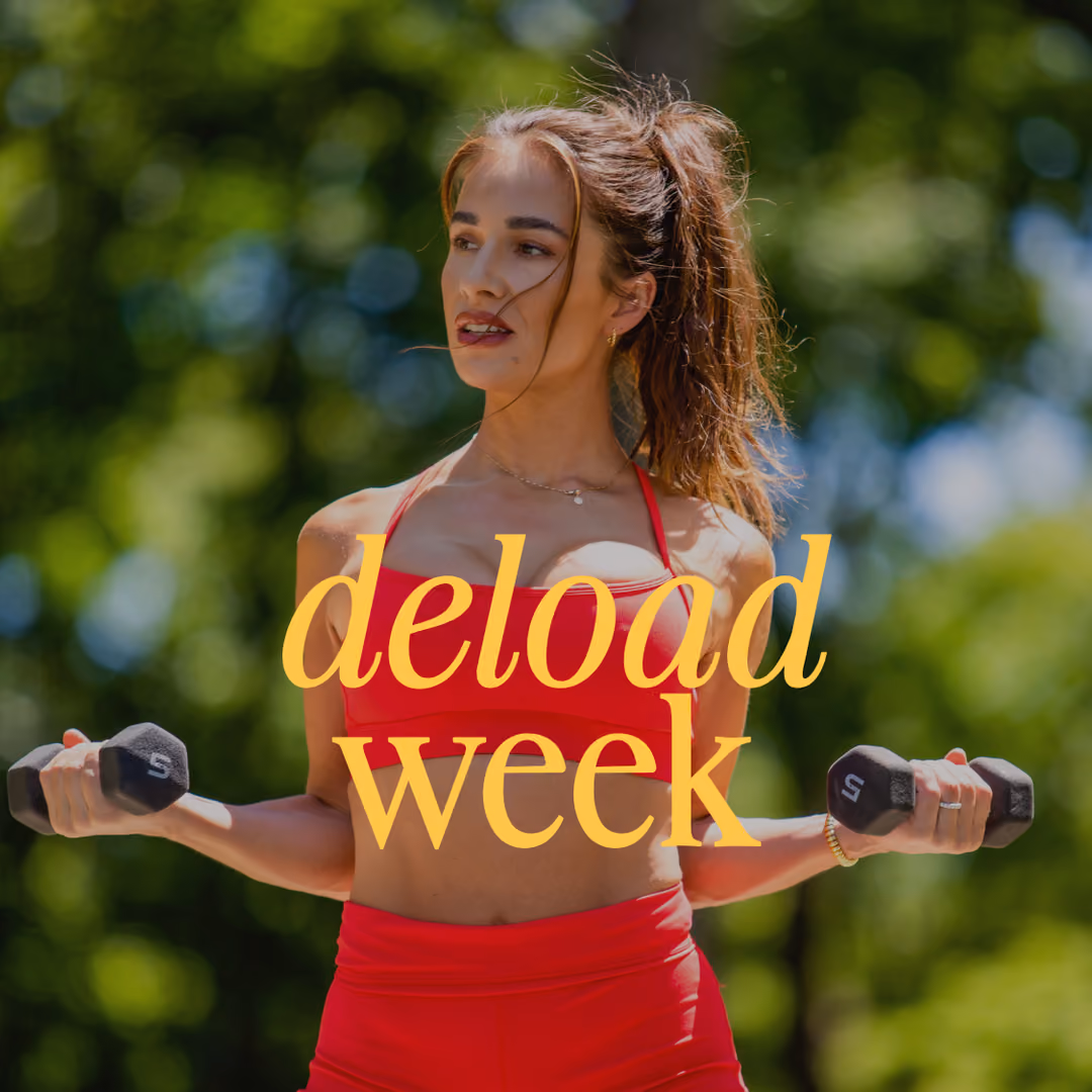 Woman in red workout clothes holding dumbbells with 'deload week' text overlaid.