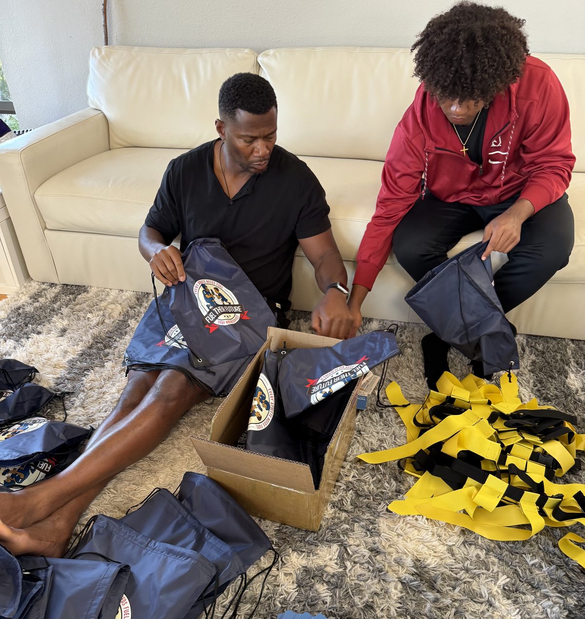 Daniel and Lennon Fells packing FTF kits together