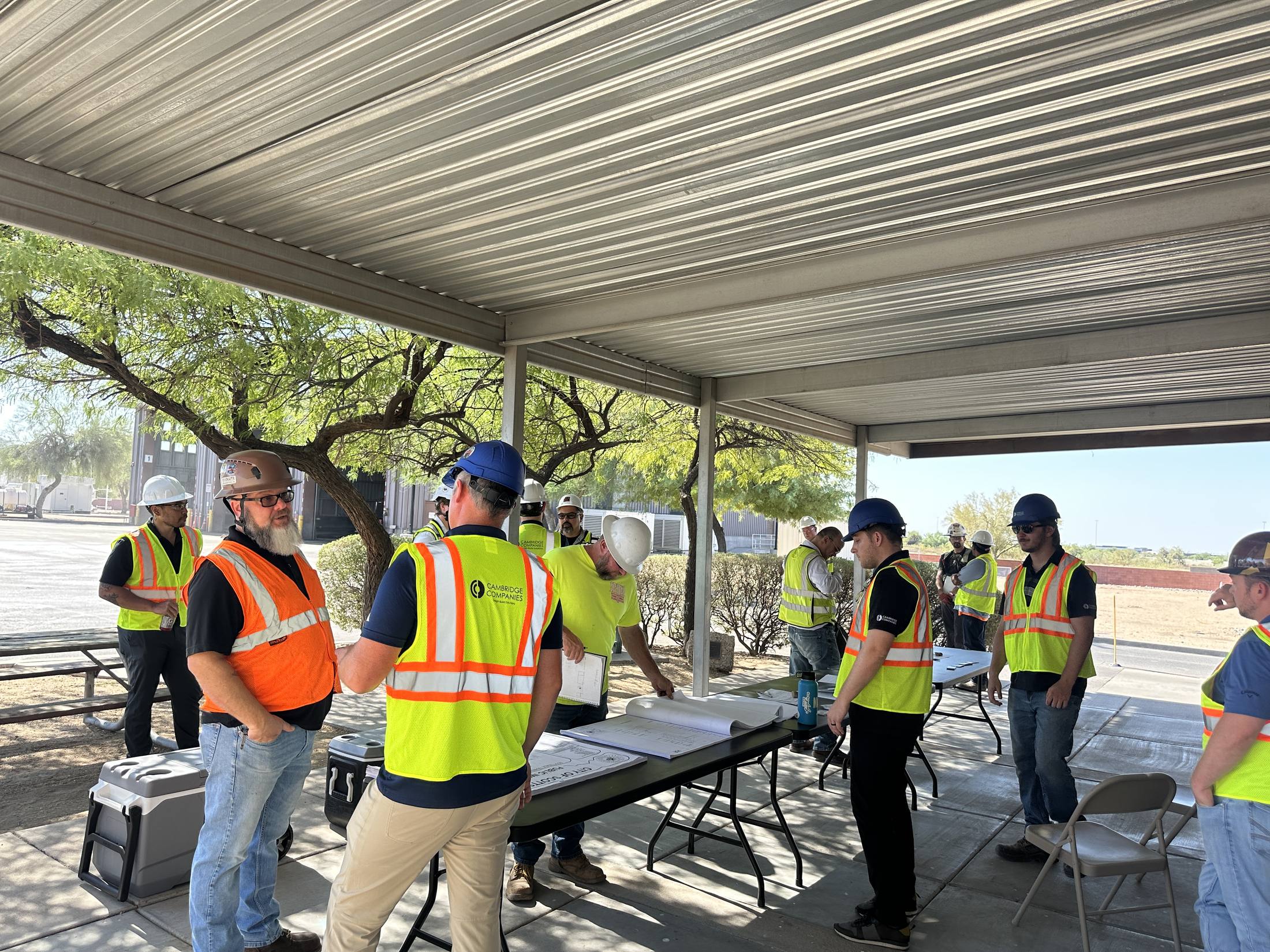 Cambridge team on site at the three month walk through