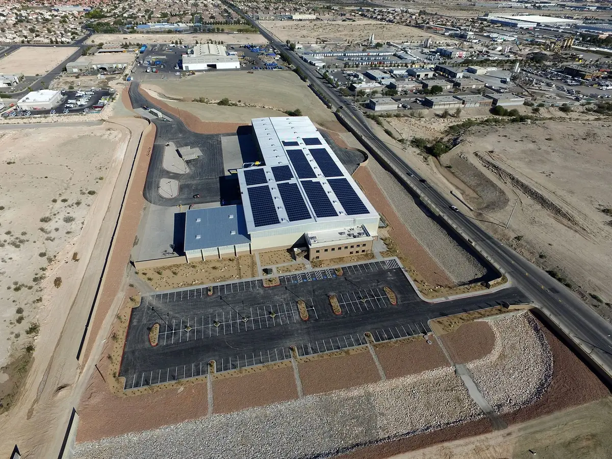 Aerial view of the Las Vegas processing facility with rooftop skylights in the desert