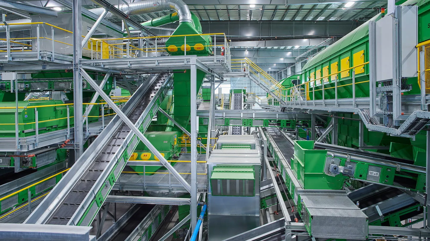 Green sorting equipment and conveyors installed inside a new material recovery facility