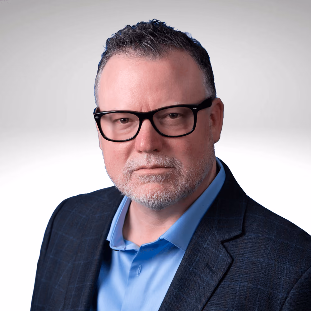 Headshot of Chris Logan of Cambridge Companies
