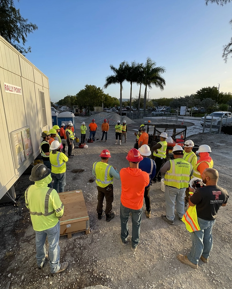 Morning Safety Standdown meeting at a construction site. 
