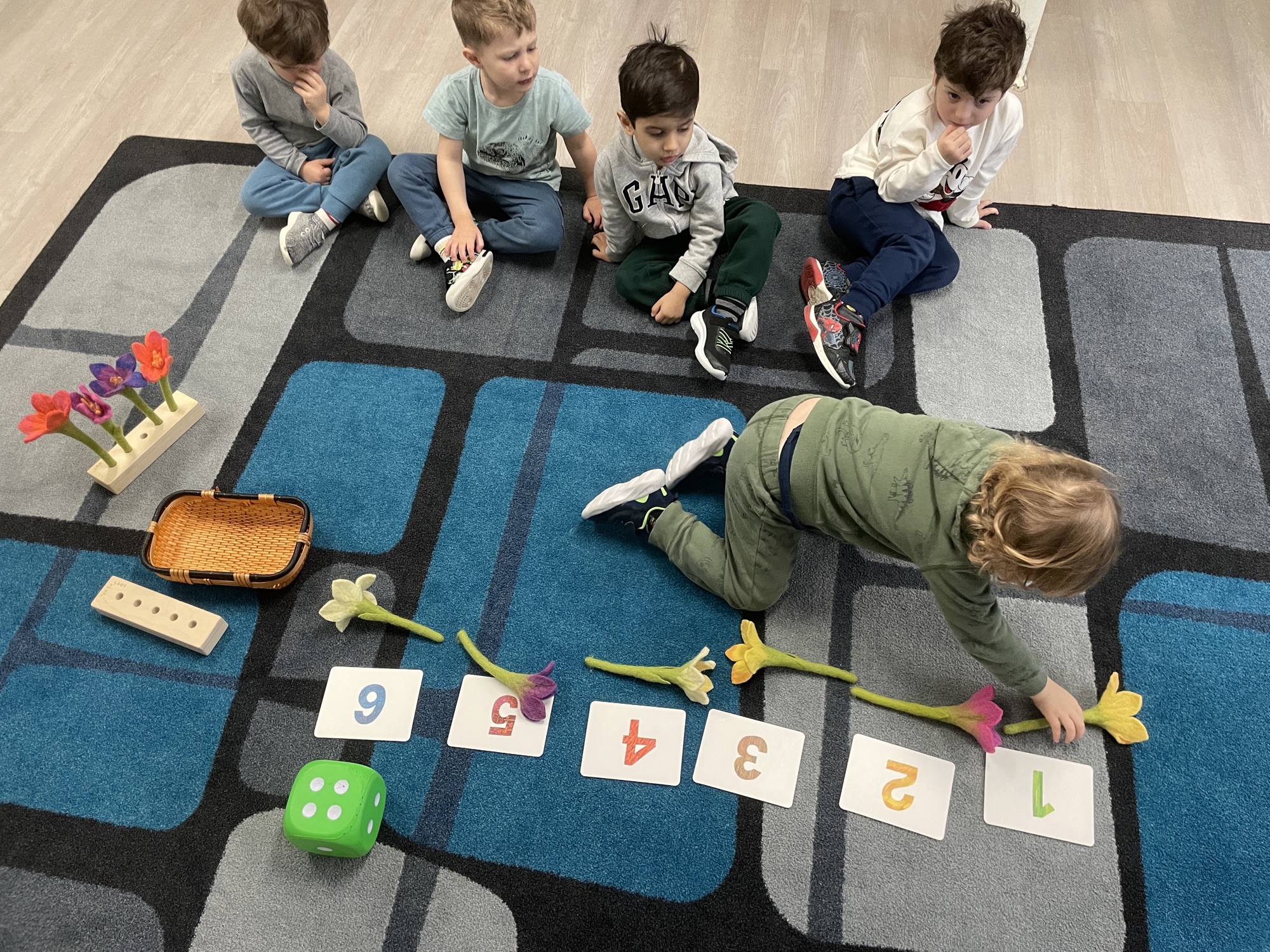 Children counting flowers together