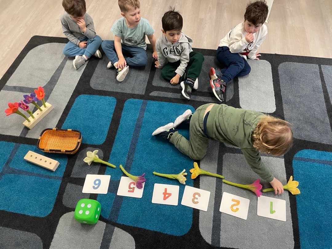 Children counting flowers together