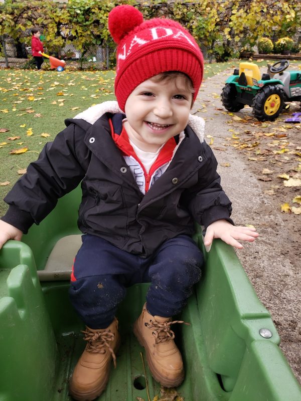 Children with the wagon at pickup