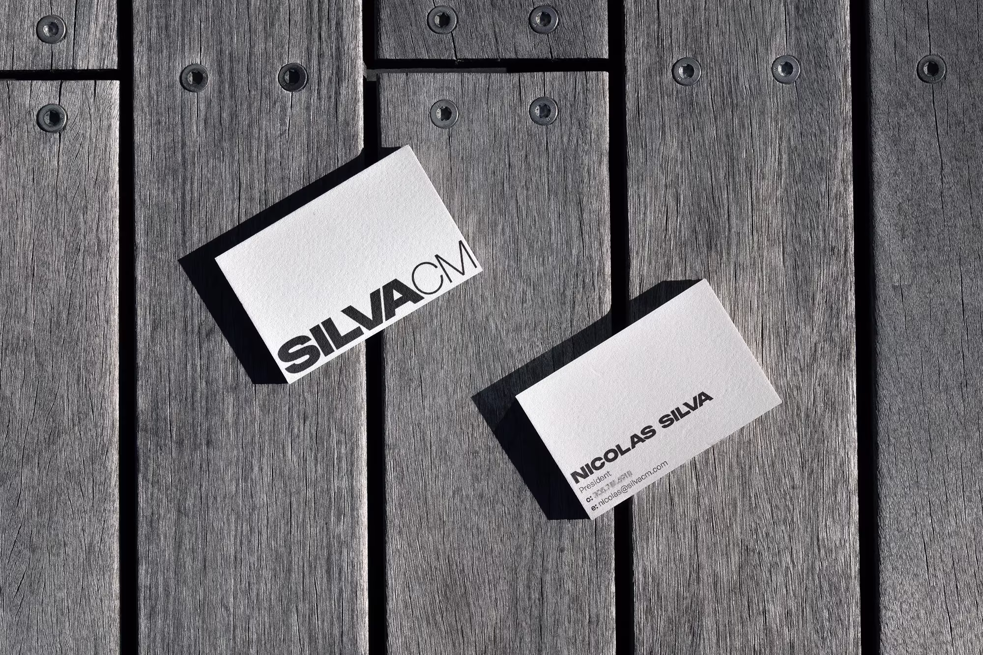 Silva CM branded business cards.
