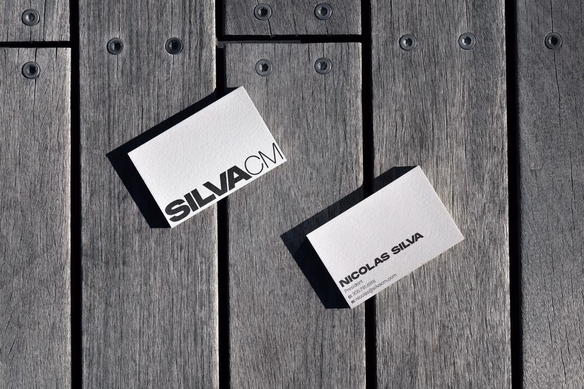 Silva CM logo on a business card.