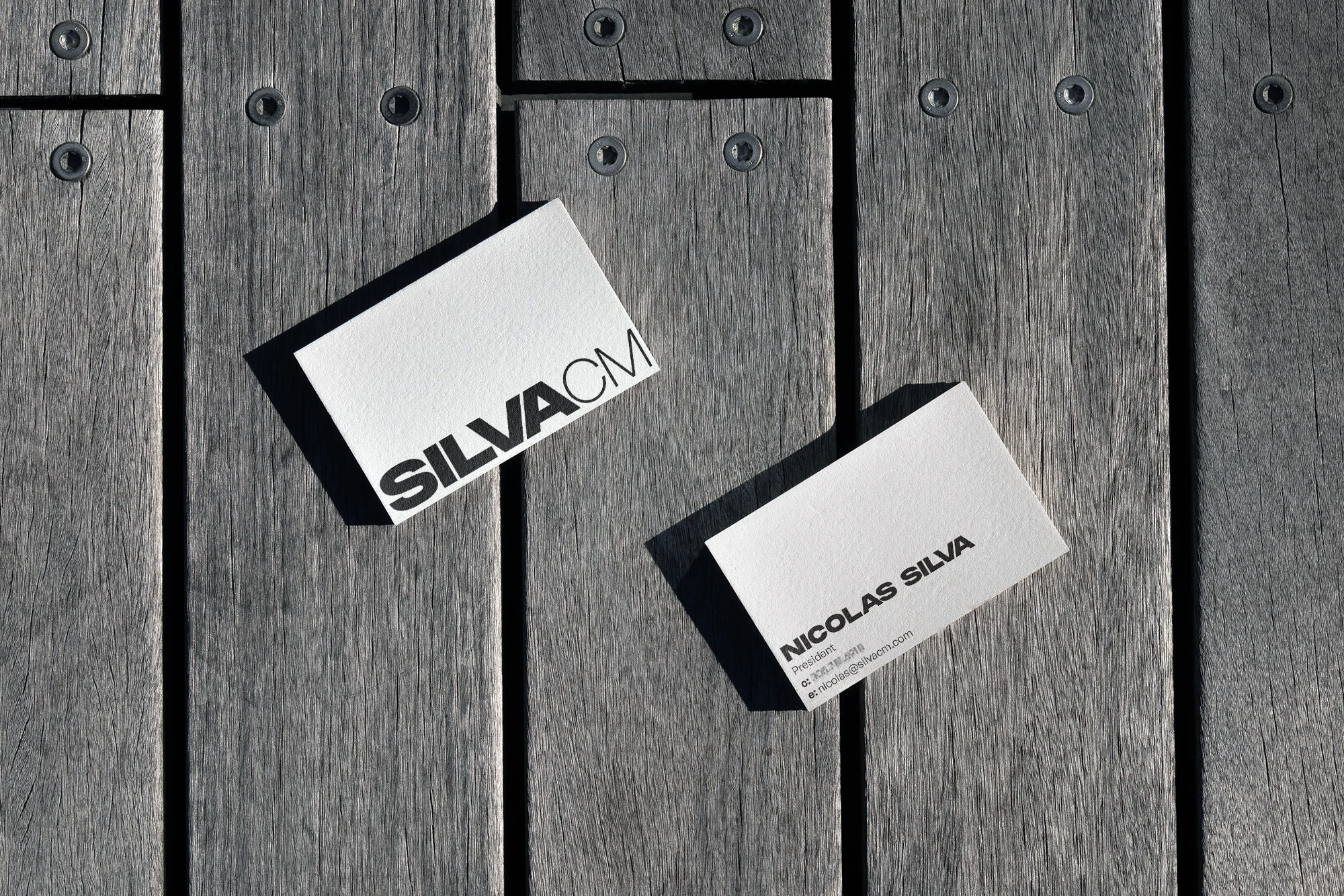 Silva CM logo on a business card.