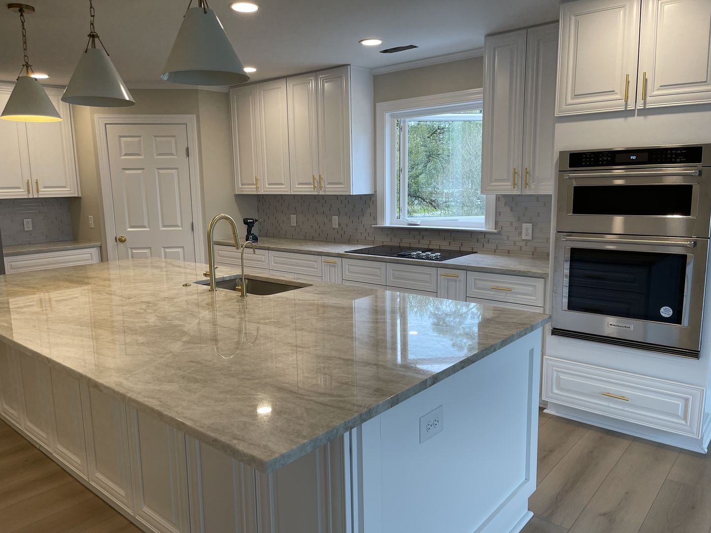 Kitchen remodel with double wall ovens and custom cabinetry — Daybreak Construction