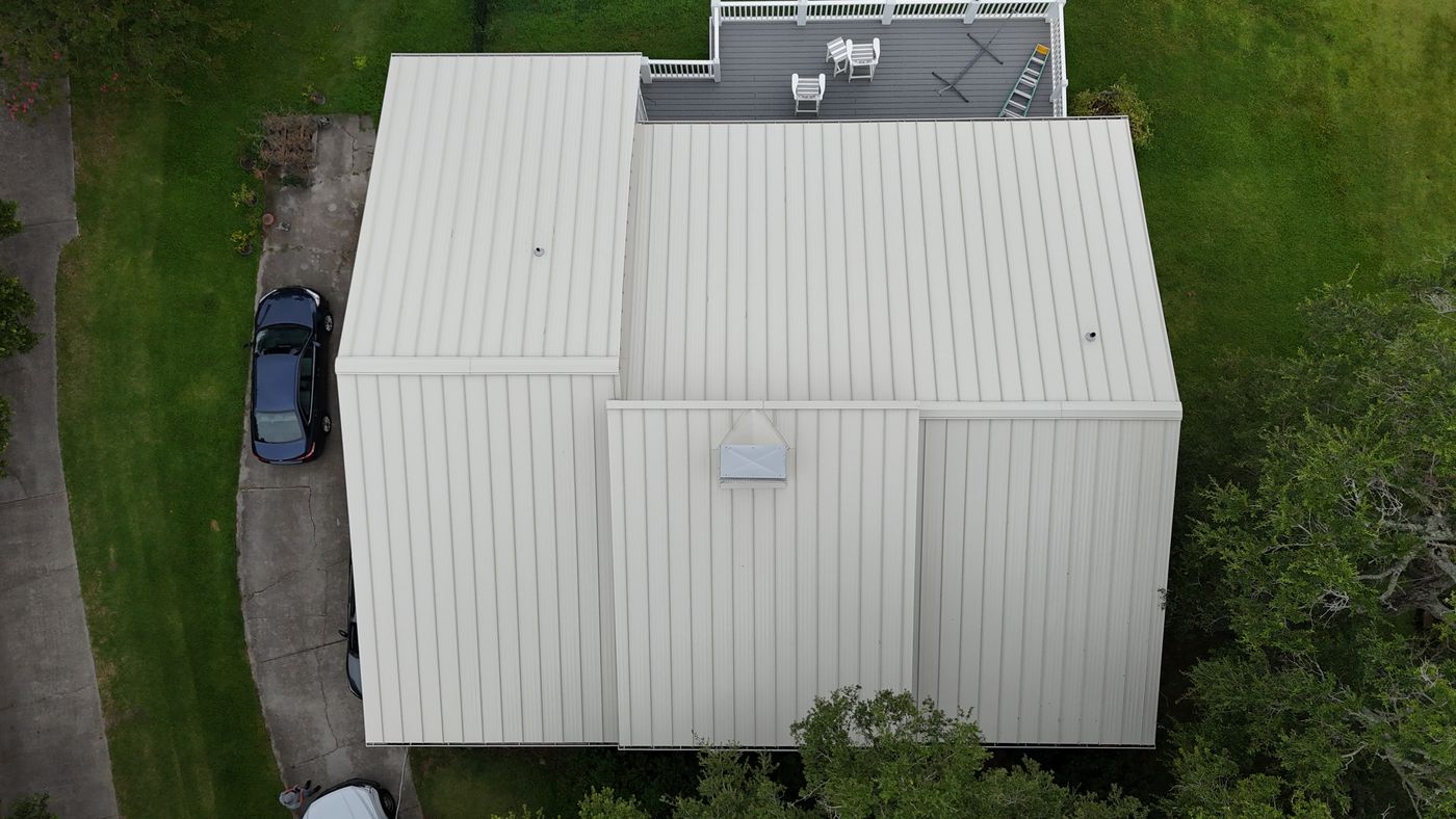 Aerial view of a completed standing-seam metal roof — Daybreak Construction