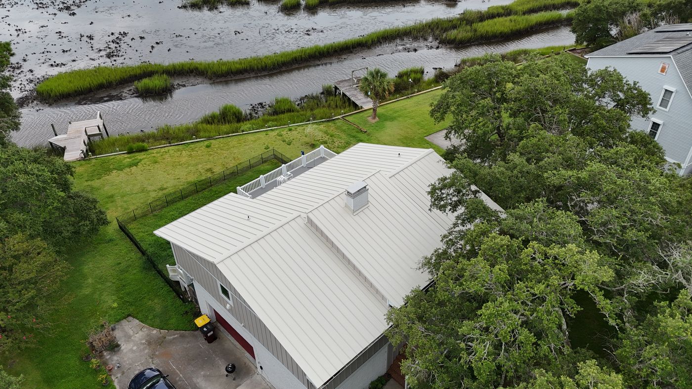 Standing-seam metal roof installation — Daybreak Construction
