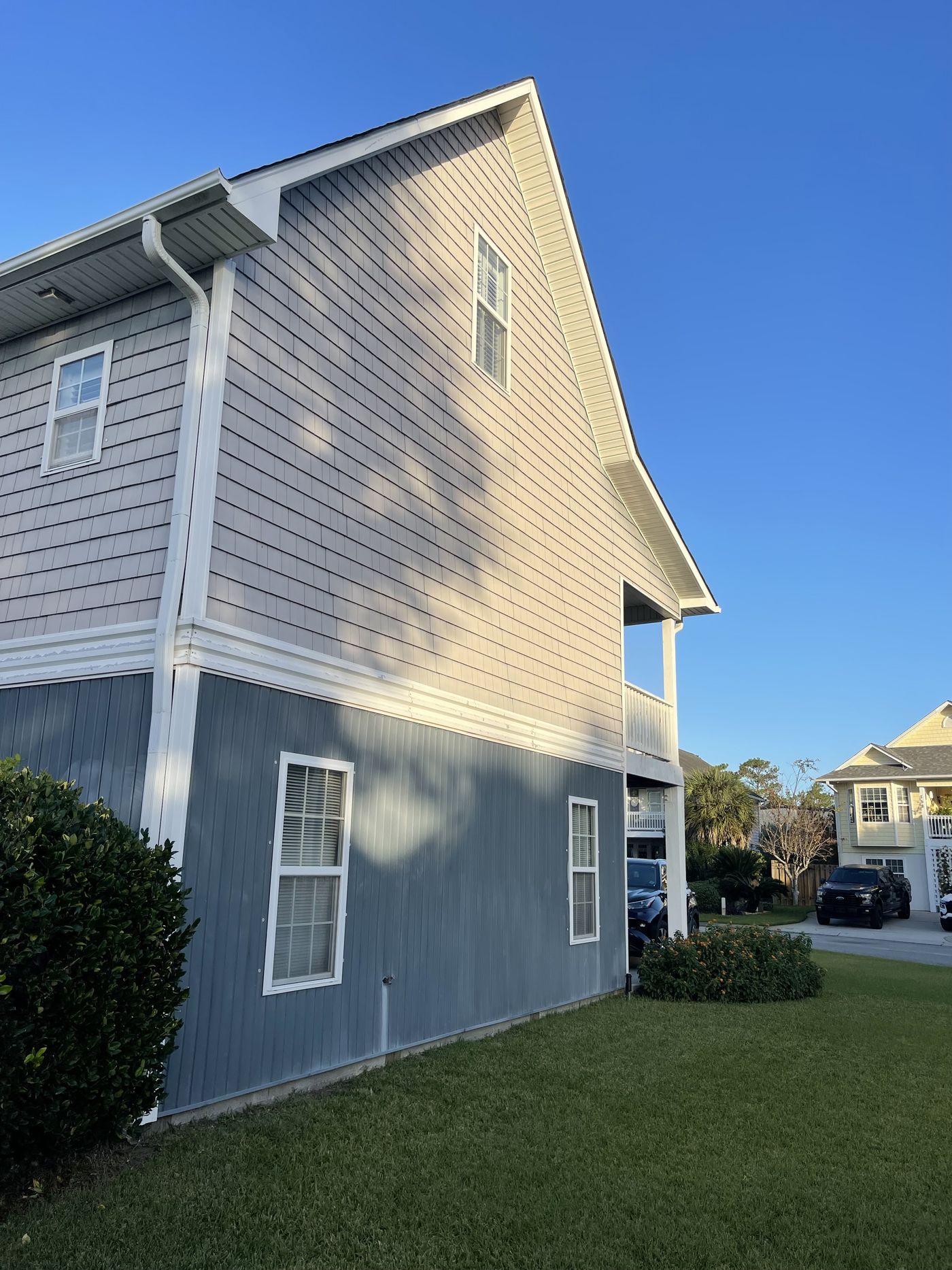 New shake siding with board-and-batten accents — Daybreak Construction