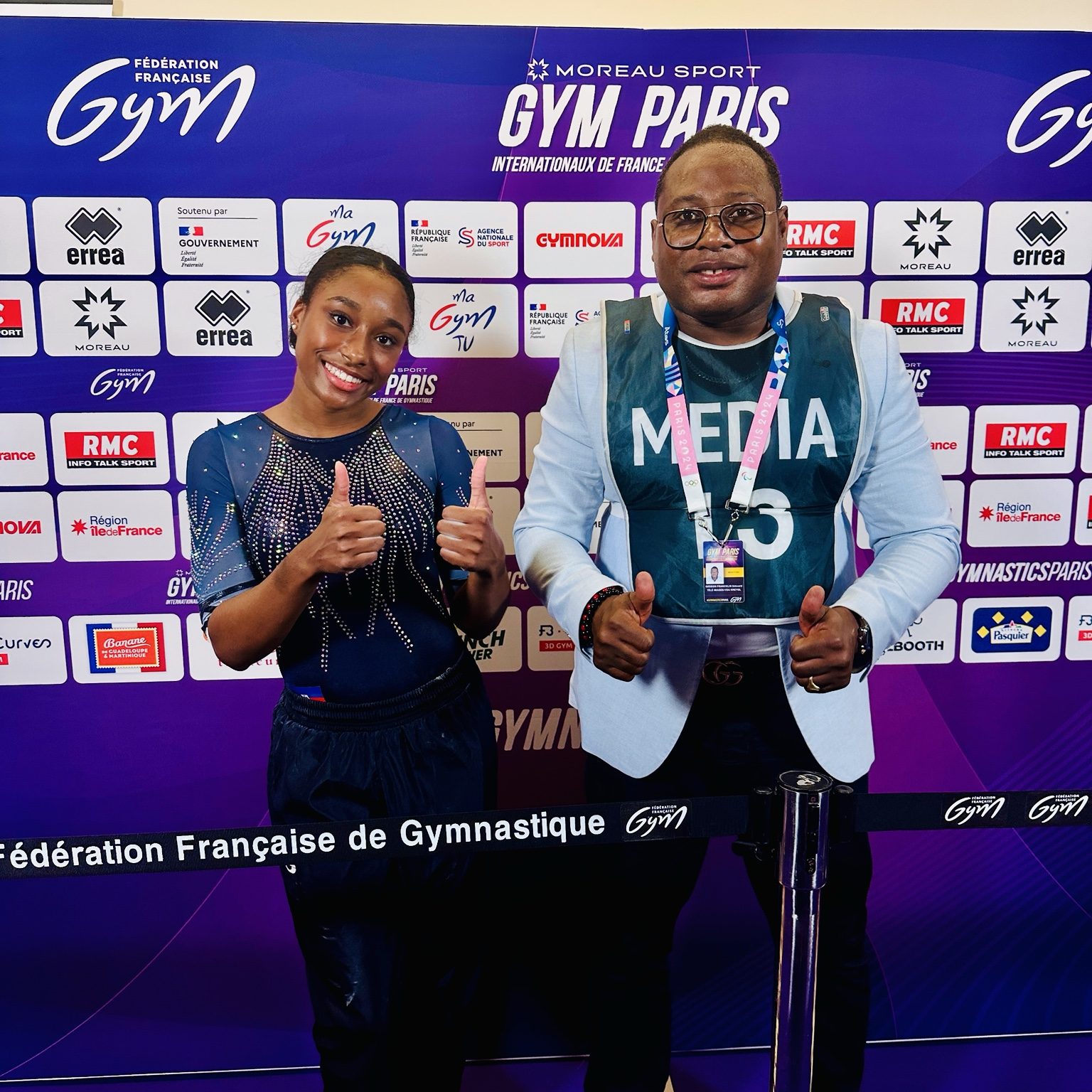 Gédem's Francklin Édouard et la gymnaste haïtienne Khloe Ann Timmer, dans l'espace média de Gym Paris 2025