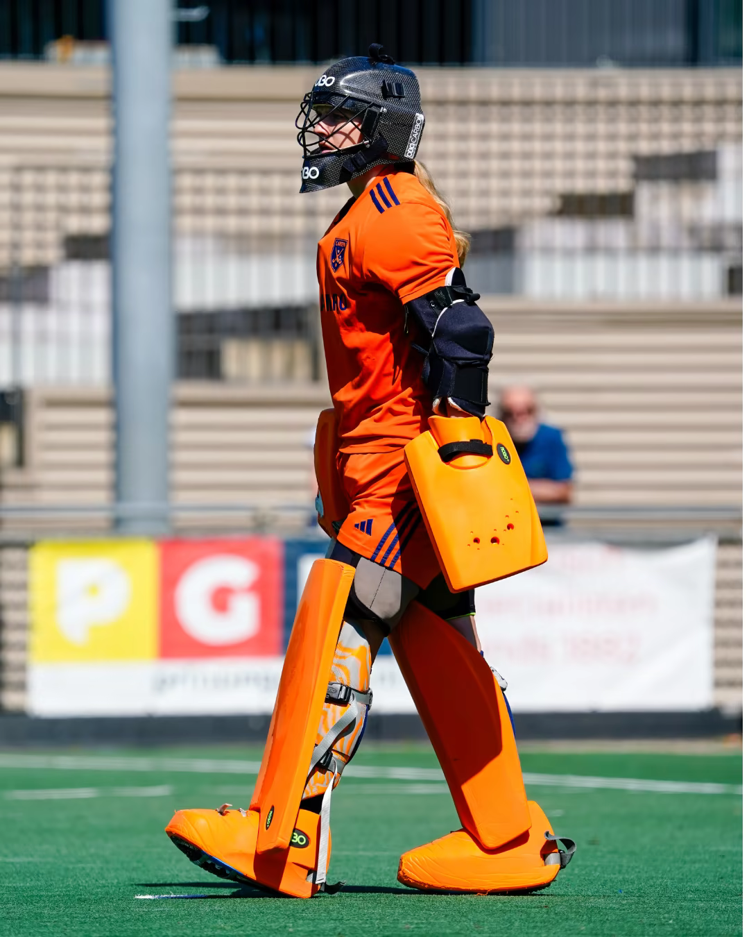 Famke Poolman in field hockey goalkeeper gear