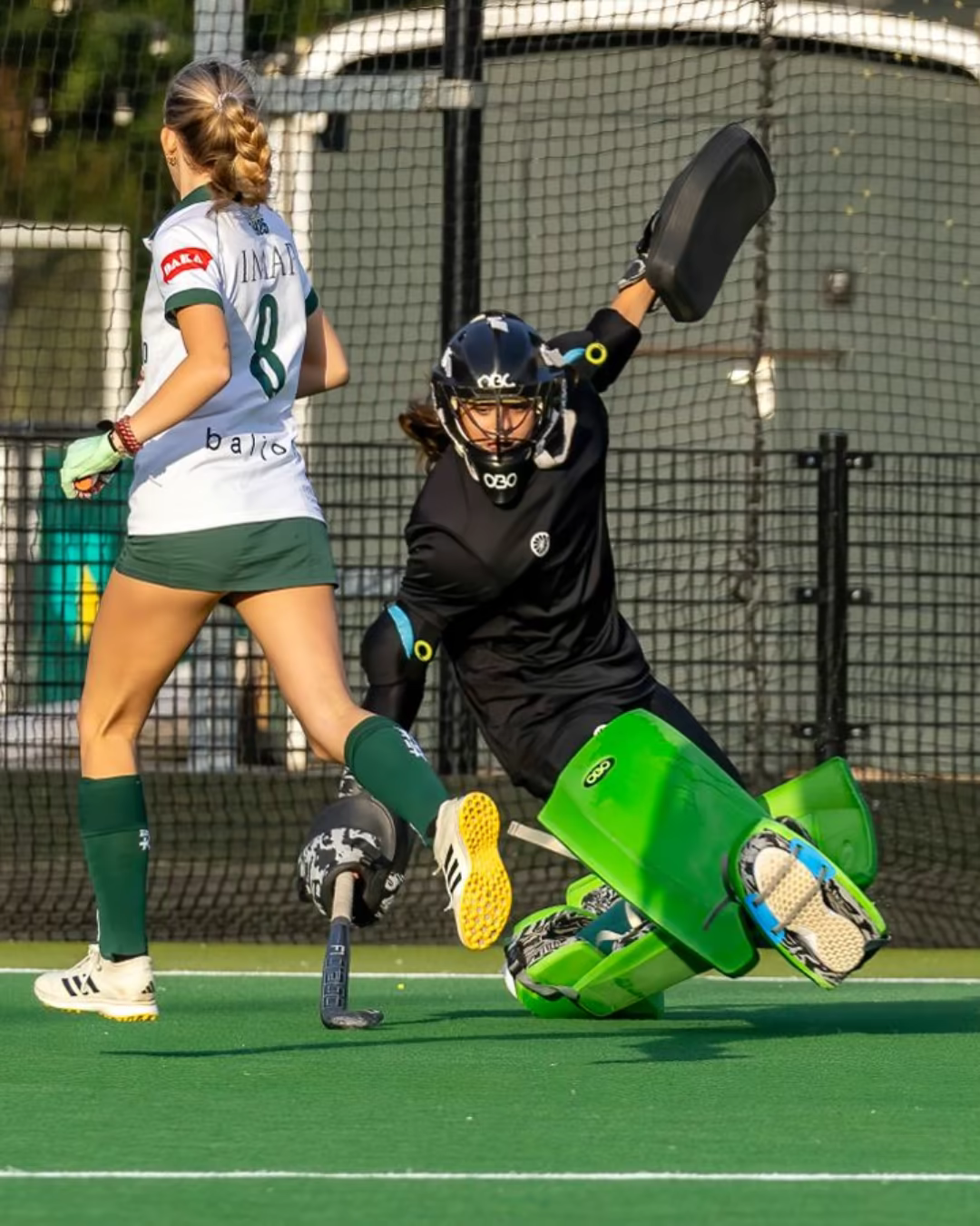 Judith van Aartsen making a field hockey save