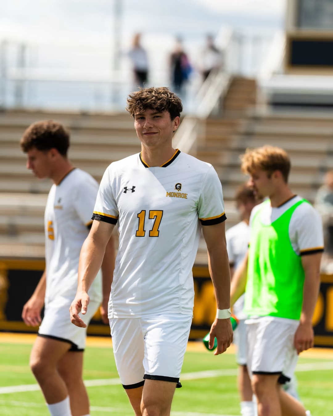Andrew O’Neill walking on the soccer field