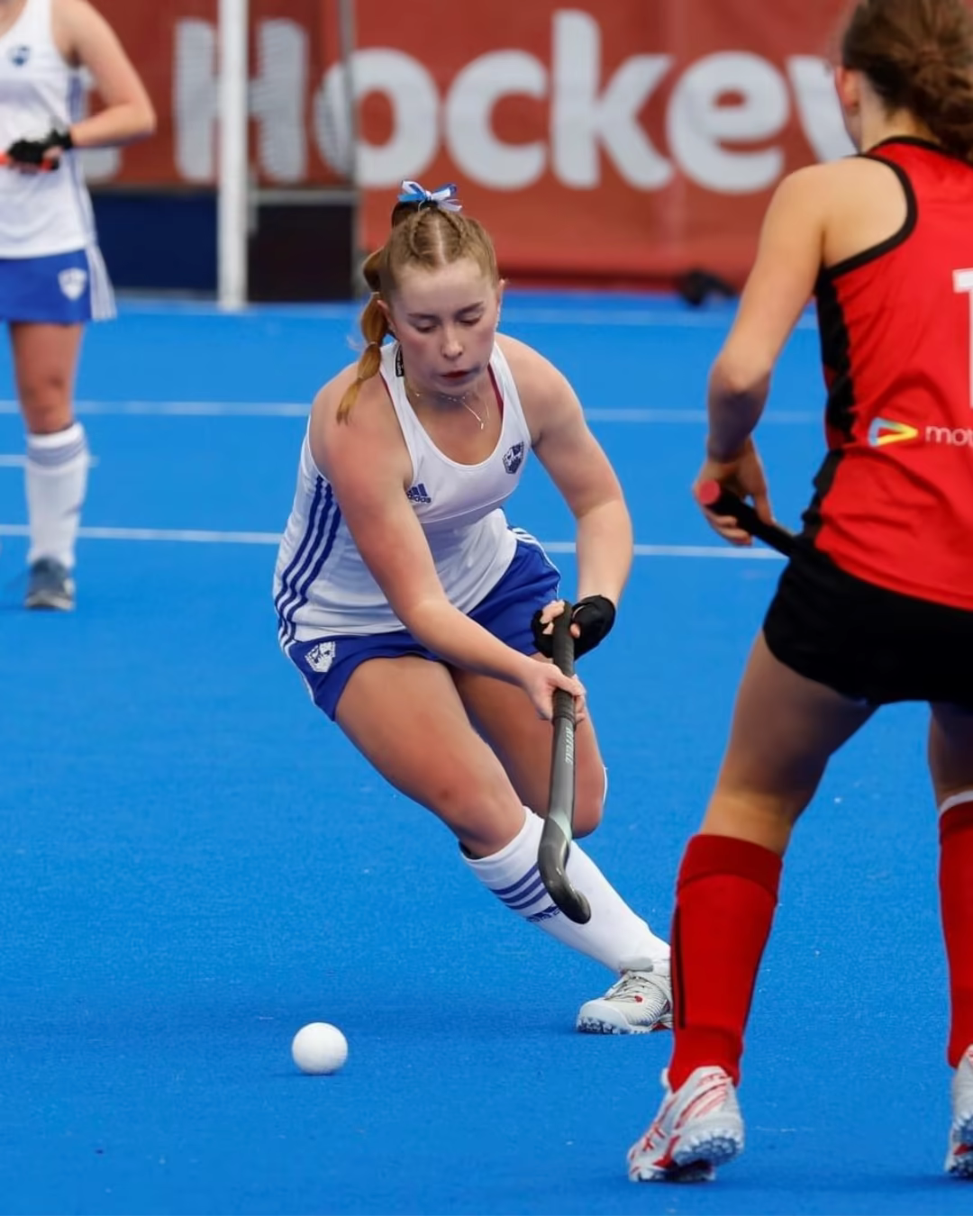Ava Brewer playing field hockey