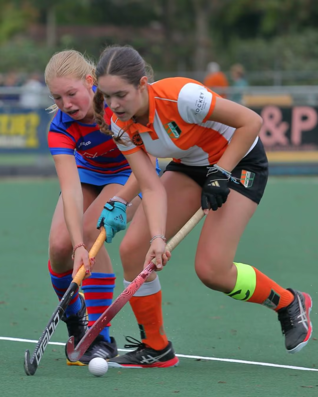 Charlotte Biron playing field hockey