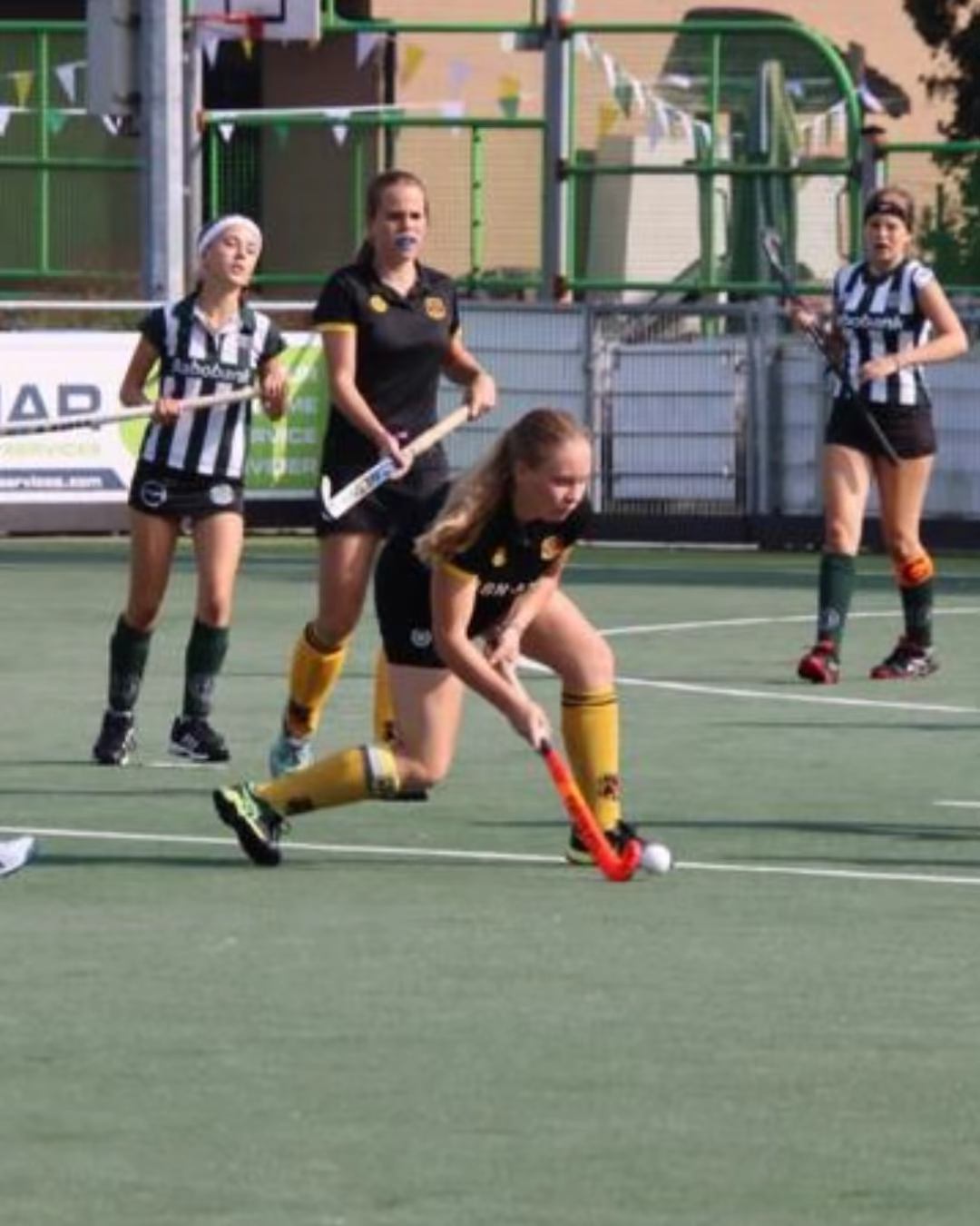 Amelie Arts playing field hockey