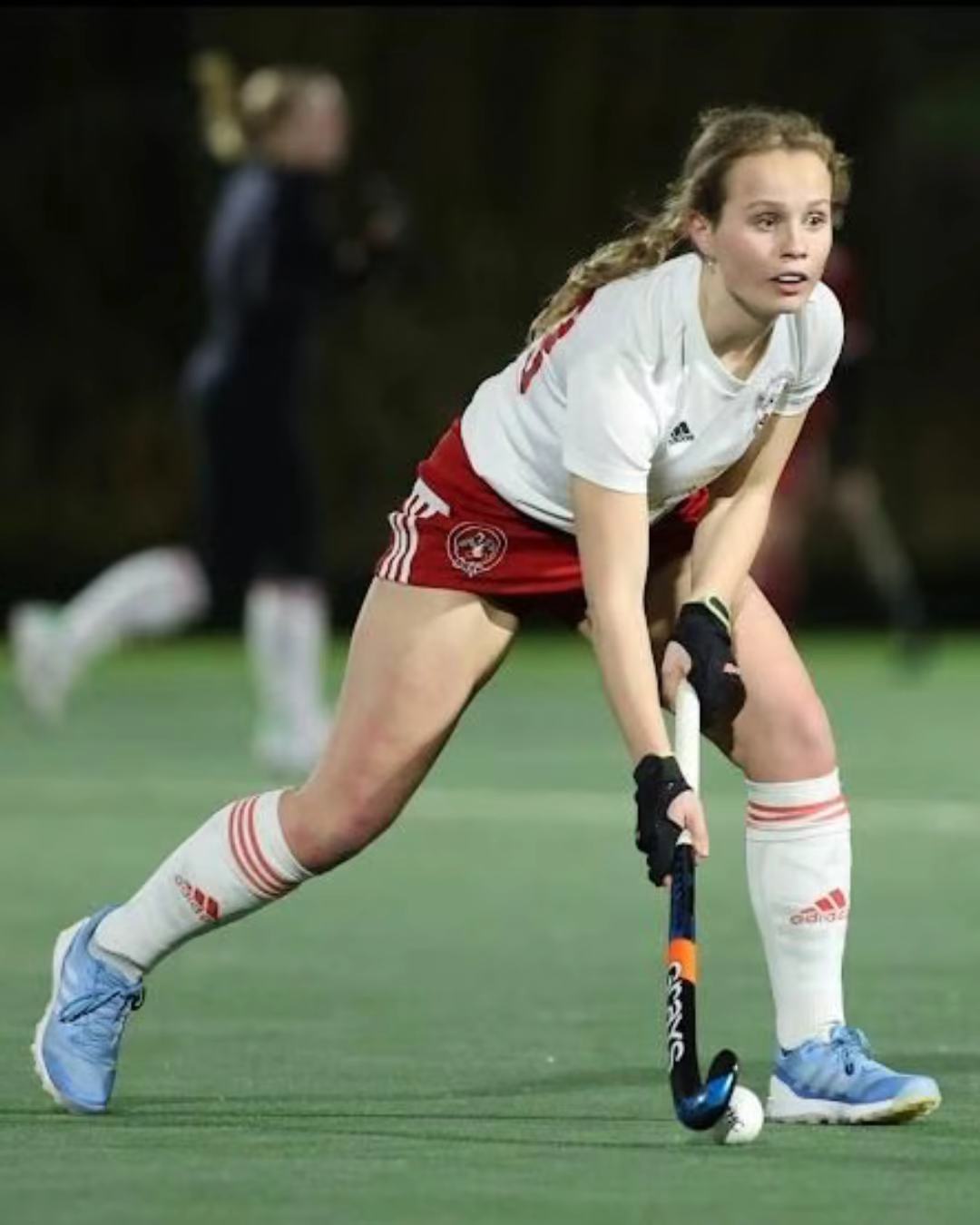 Tilly Olney playing field hockey