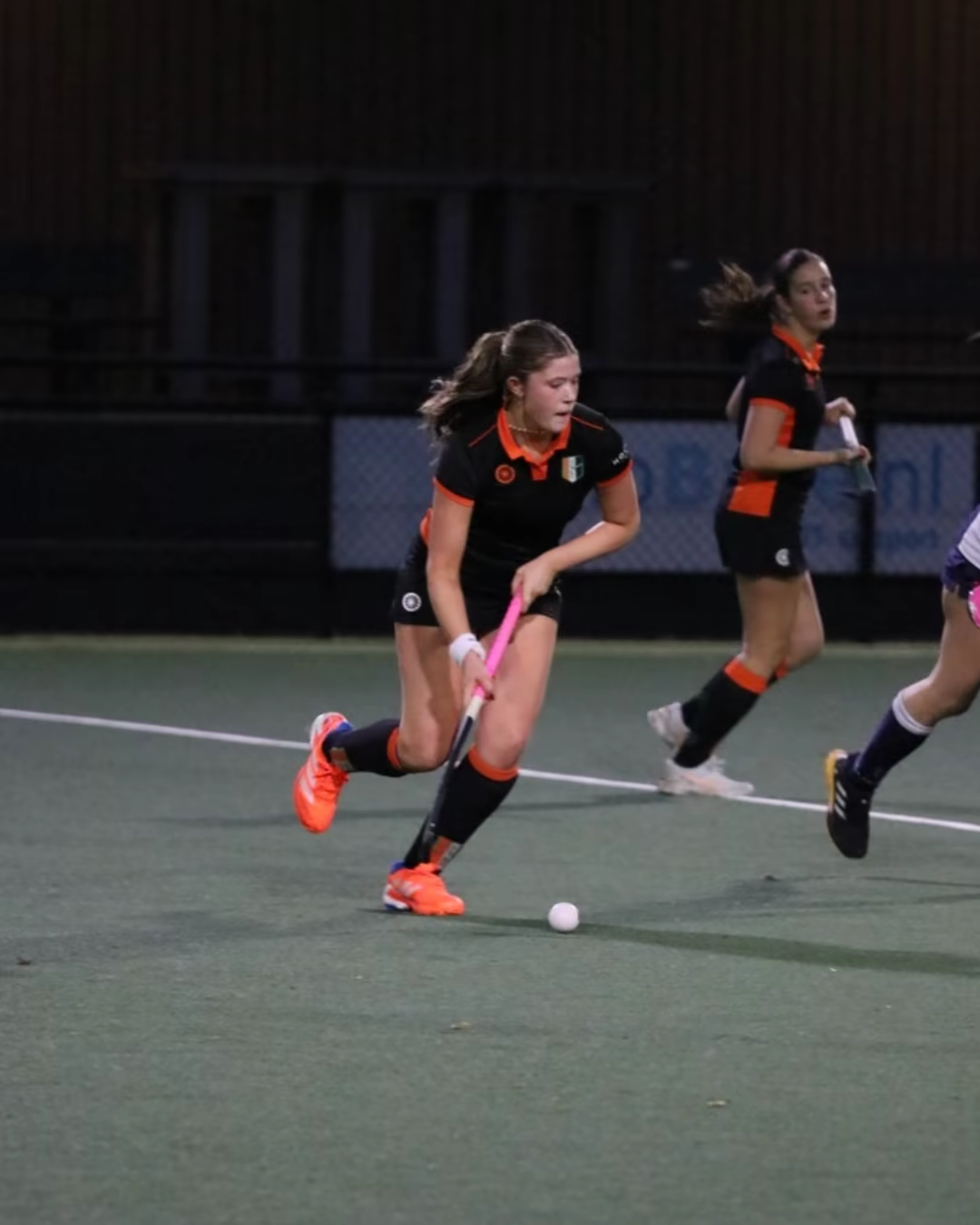 Ryann Giannini playing field hockey