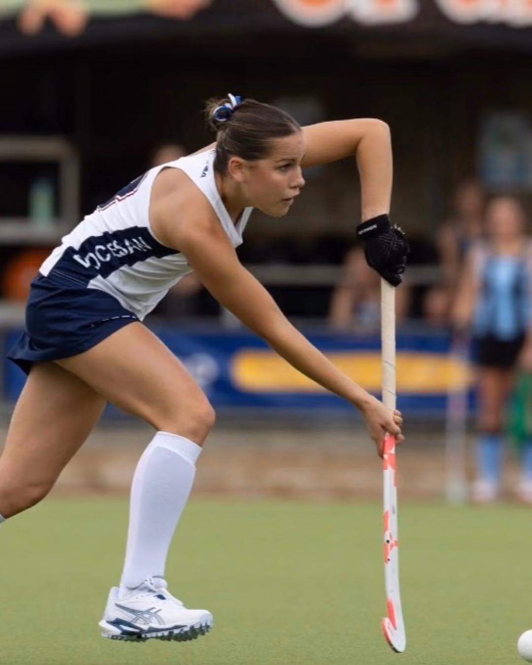 Hollie Lawson in field hockey action