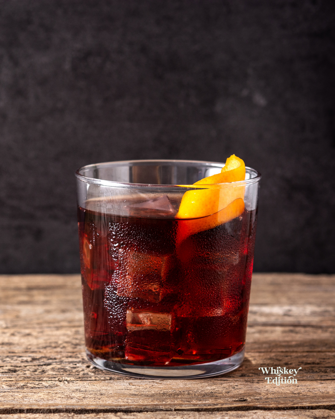Boulevardier in a rocks glass with ice, garnished with an orange twist