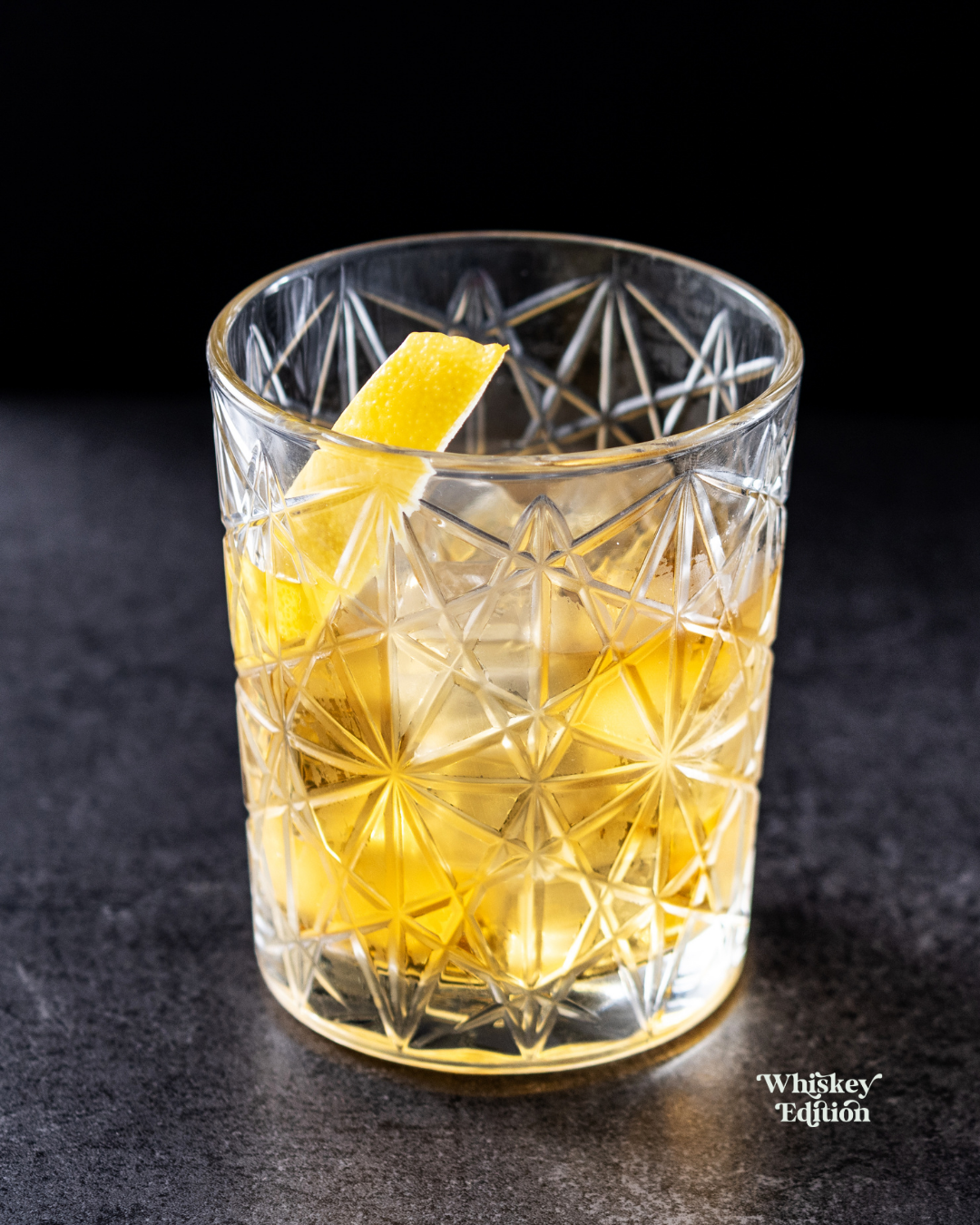 Rusty Nail in a rocks glass over ice
