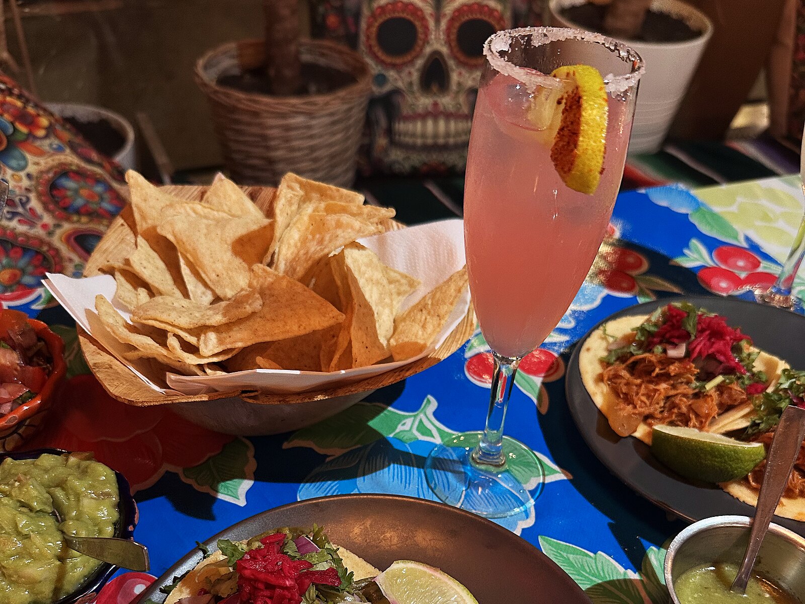 A Pink Paloma and tortilla chips at Pueblo Bar