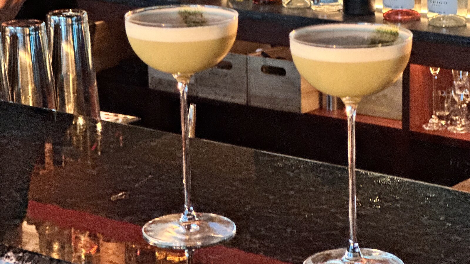 Two Matcha Martinis on the bar at Bisoubisou in evening sun