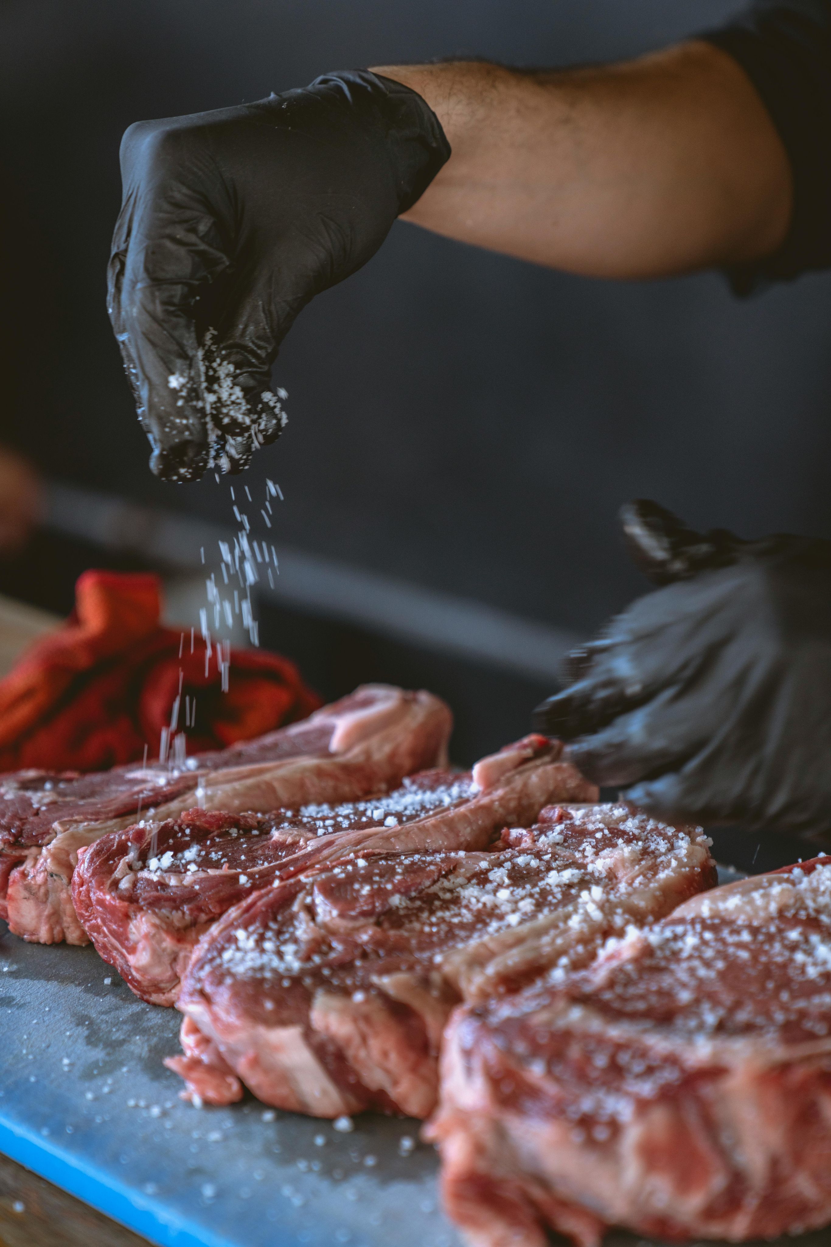 Culinary preparation with protective gloves