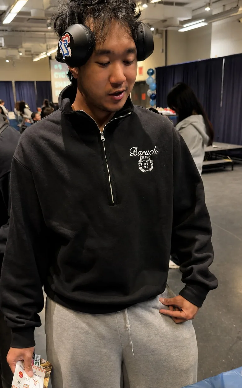 Script quarter zip. Heavyweight quarter zip · Embroidered crest.