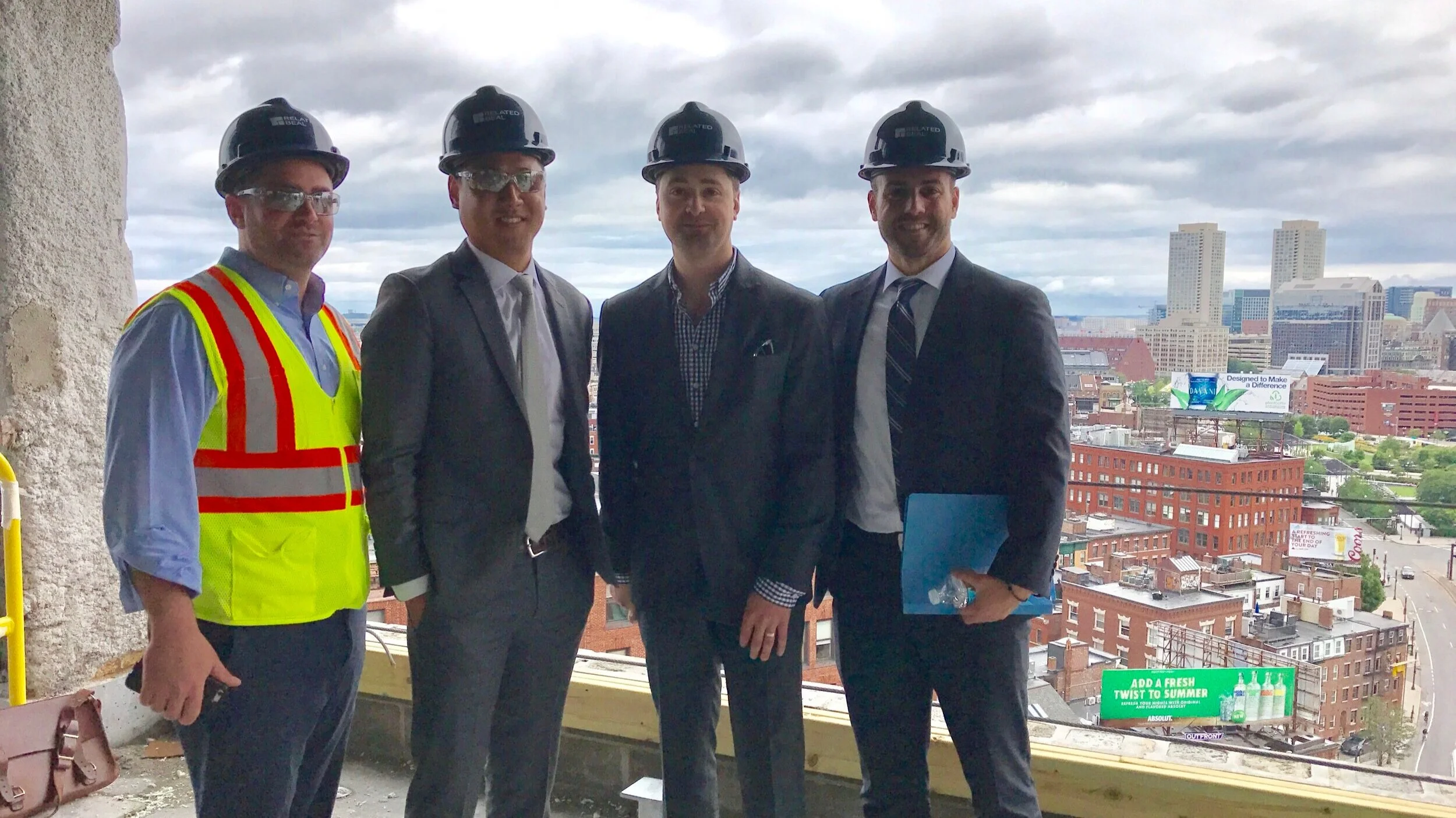 Josh Zakim with a development team overlooking Boston