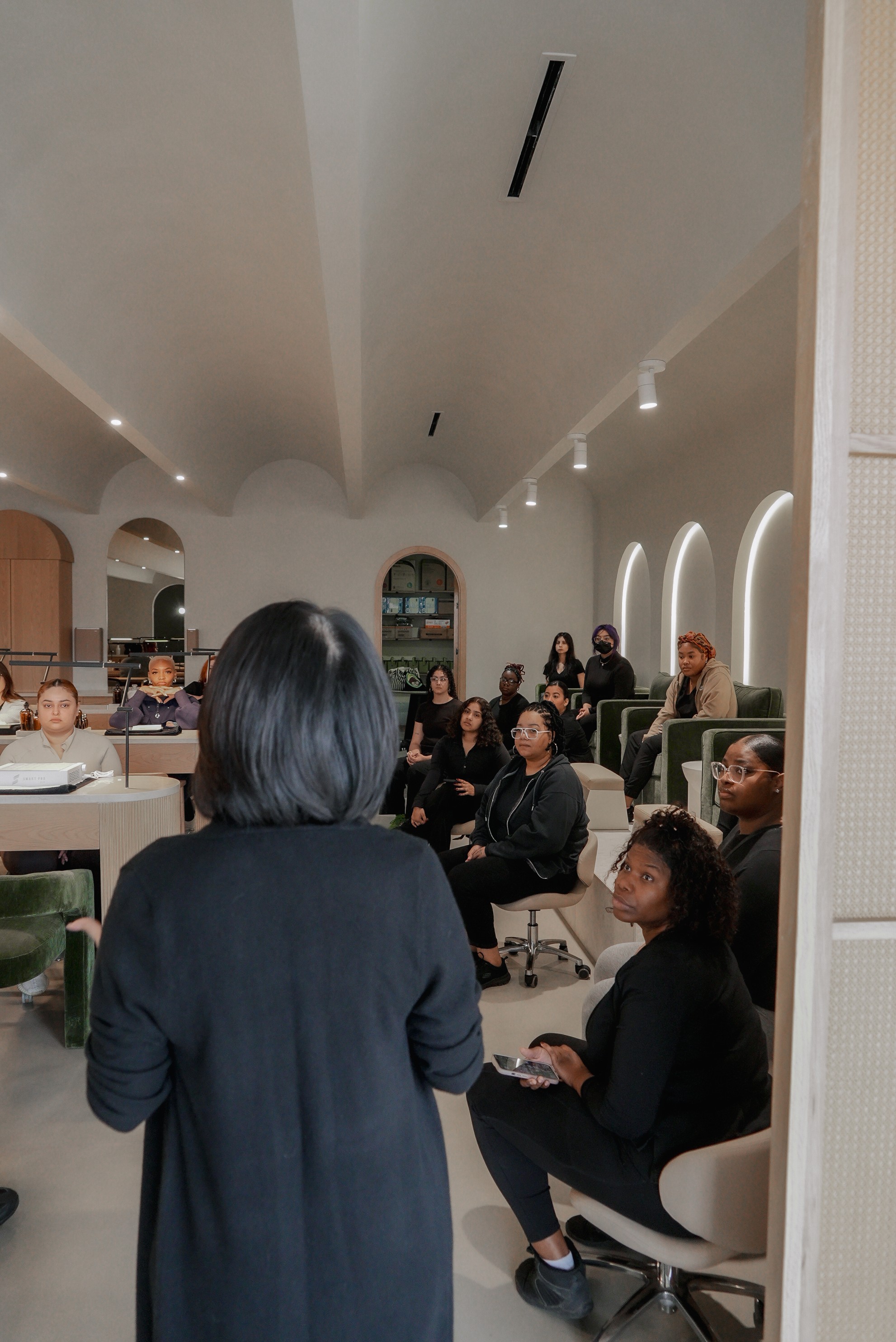 The Earth Nail Spa team gathered for a meeting in the studio