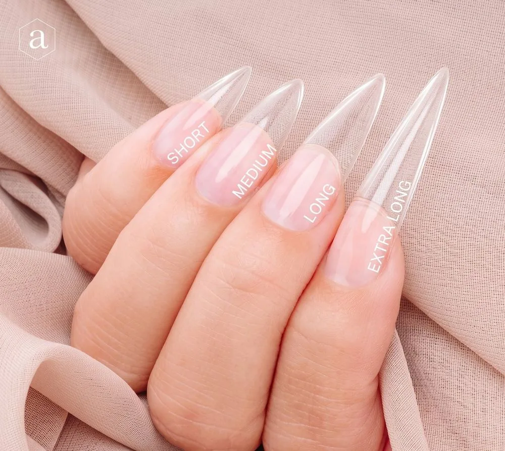 Stiletto Gel-X nails shown in short, medium, long, and extra long