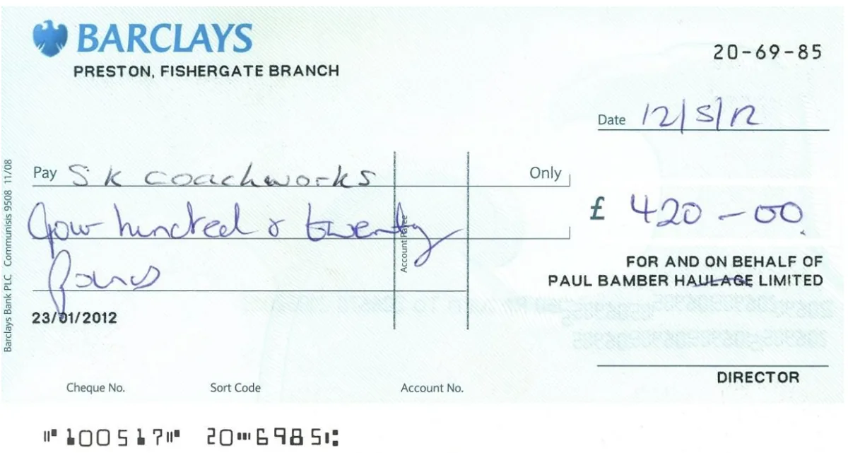 A 2012 Barclays business cheque completed by hand