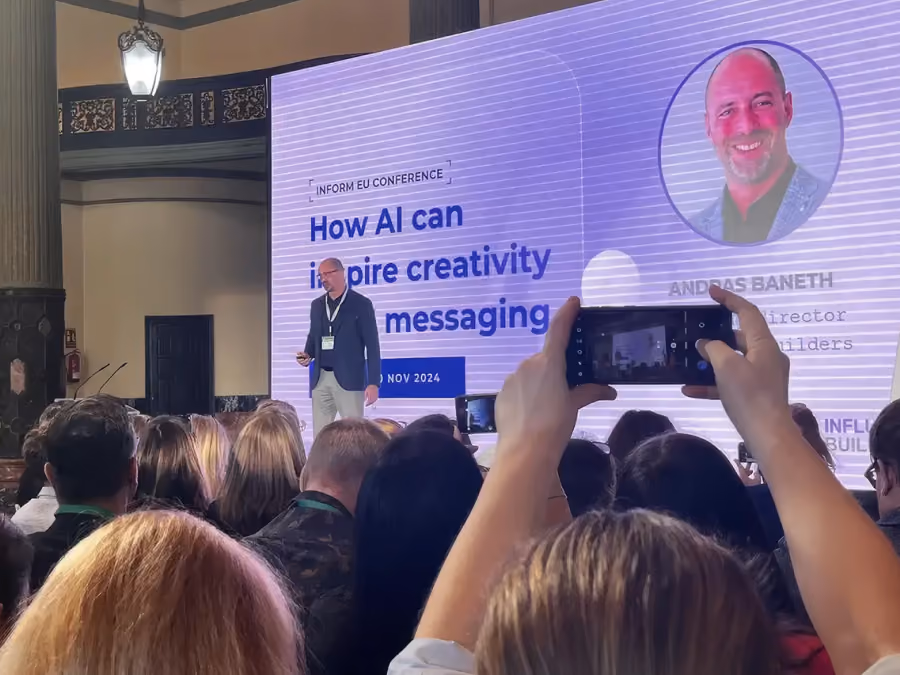 Speaker Andreas Baneth presenting on AI inspiring creativity and messaging at INFORM EU Conference 2024.