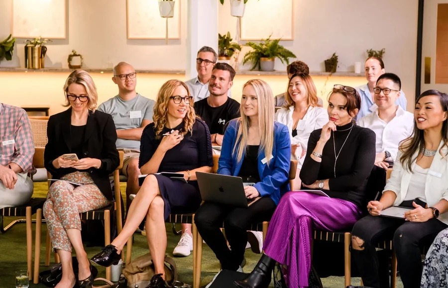 Group seated together at an EO Sydney event