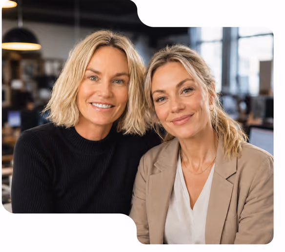 Two women working together at a laptop