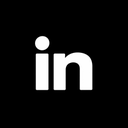 White LinkedIn logo on black background.
