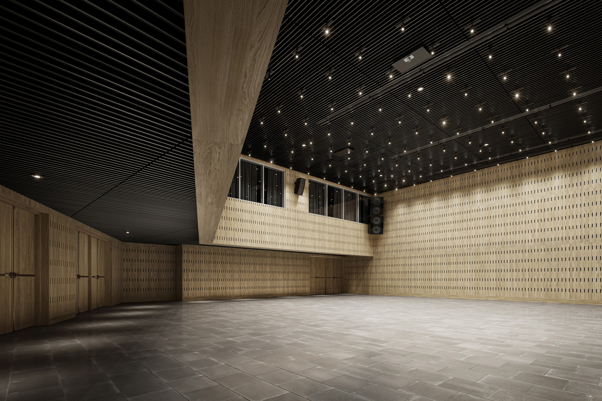 Large empty modern room with black slatted ceiling lights, wood paneled walls, and gray tiled floor.