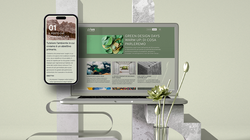 Portatile e smartphone mostrano contenuti su design green e tutela ambientale su sfondo astratto.