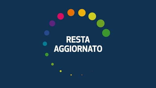 Cerchio di pallini colorati con testo bianco centrale Resta aggiornato su sfondo blu scuro.