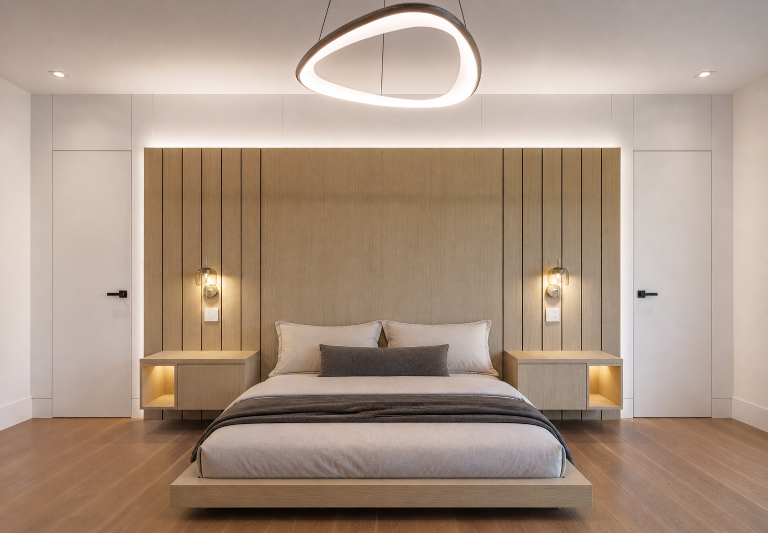 Modern bedroom with wood panelled headboard, floating nightstands, and sculptural ceiling light