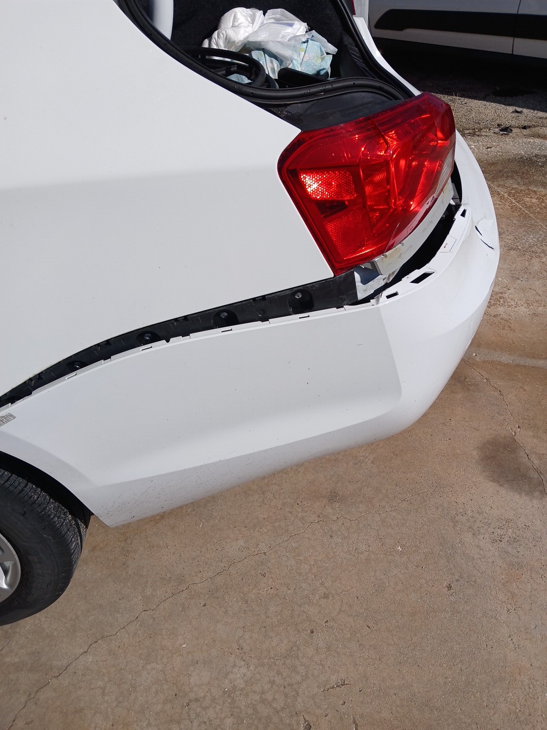 rear bumper corner before repair in Plant City