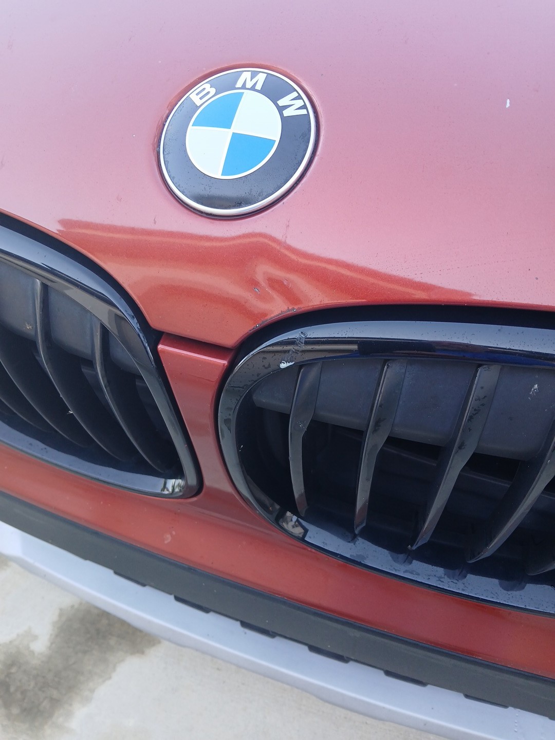 hood before repair in San Antonio