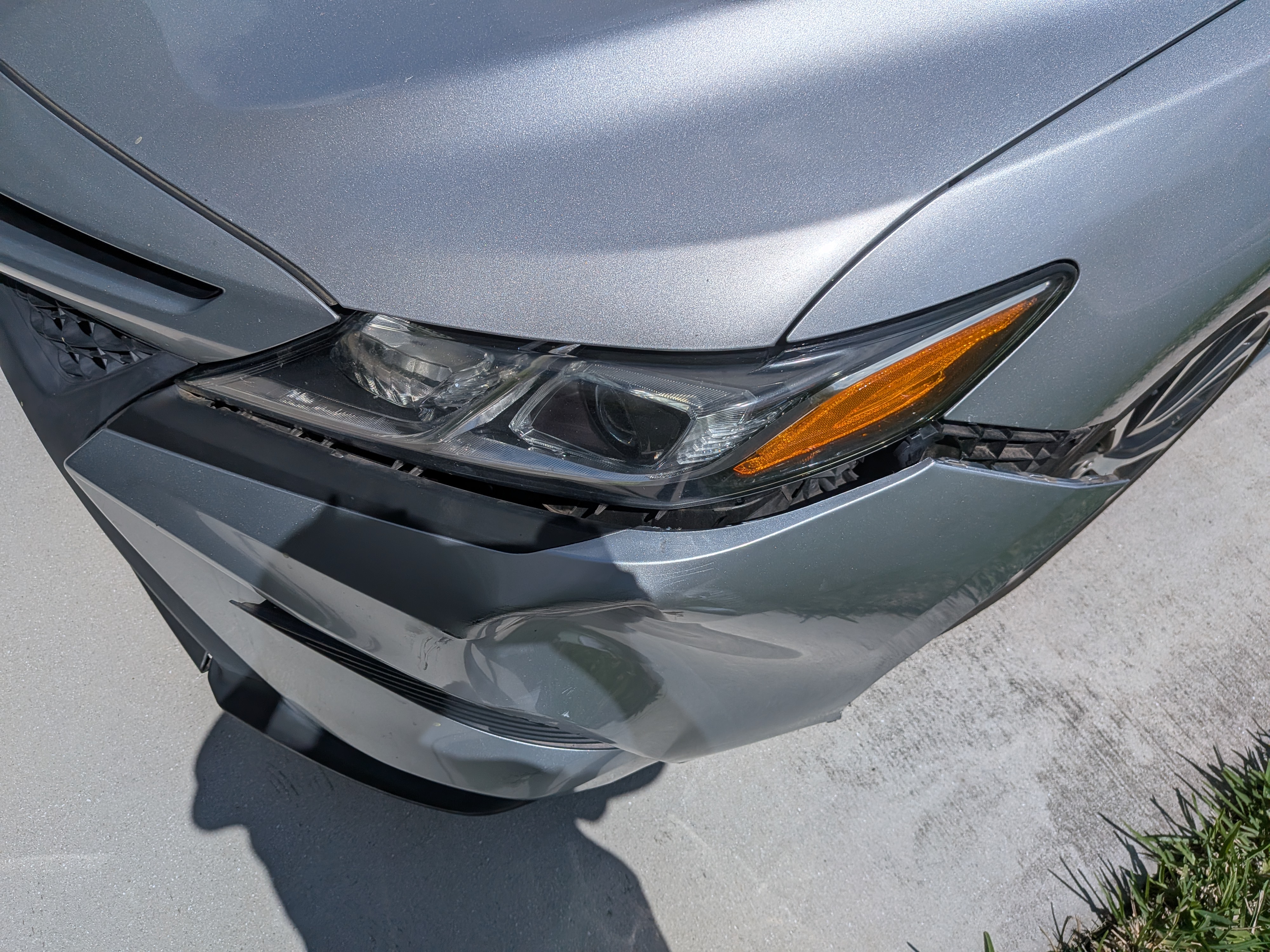 front bumper corner before repair in Wesley Chapel
