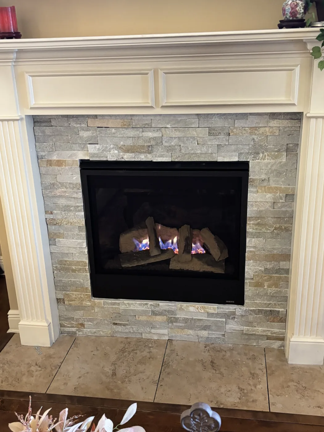 Completed stone fireplace installation by 1st Choice Residential