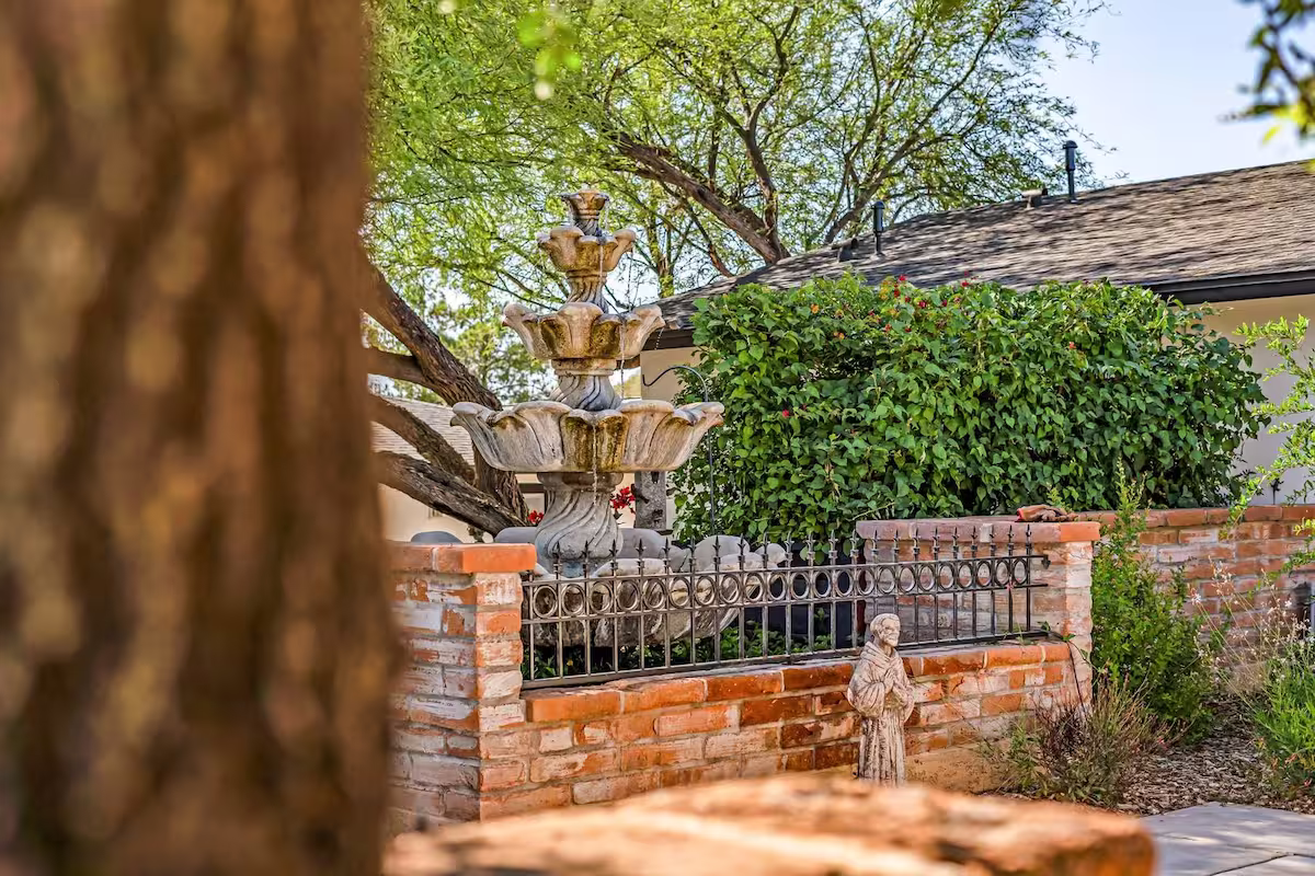 Courtyard fountain and garden at Heritage Oaks in Tucson, where our team works